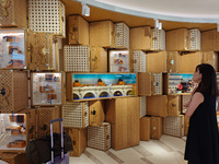 Visitors are shopping at Louis Vuitton's first chocolate store in Shanghai, China, on July 23, 2024. (