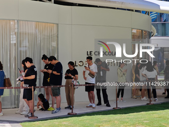 Tourists are lining up at Louis Vuitton's first chocolate store in Shanghai, China, on July 23, 2024. (