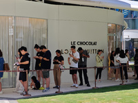 Tourists are lining up at Louis Vuitton's first chocolate store in Shanghai, China, on July 23, 2024. (