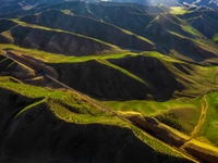 Workers are installing and inspecting a coal transport corridor on Road 147 in Hutubi County, Changji Hui Autonomous Prefecture, Xinjiang, C...