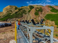 Workers are installing and inspecting a coal transport corridor on Road 147 in Hutubi County, Changji Hui Autonomous Prefecture, Xinjiang, C...