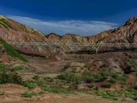 Workers are installing and inspecting a coal transport corridor on Road 147 in Hutubi County, Changji Hui Autonomous Prefecture, Xinjiang, C...