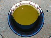 A square building and a round building are being seen in Maojianshan township, Yuexi County, in Anqing, China, on July 22, 2024. (