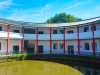 A square building and a round building are being seen in Maojianshan township, Yuexi County, in Anqing, China, on July 22, 2024. (