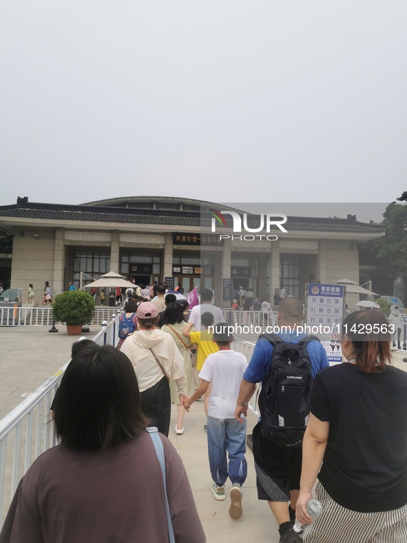 Tourists are visiting Emperor Qinshihuang's Mausoleum Site Museum in Xi'an, China, on July 13, 2024. 