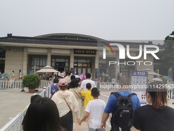 Tourists are visiting Emperor Qinshihuang's Mausoleum Site Museum in Xi'an, China, on July 13, 2024. (