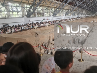 Tourists are visiting Emperor Qinshihuang's Mausoleum Site Museum in Xi'an, China, on July 13, 2024. (