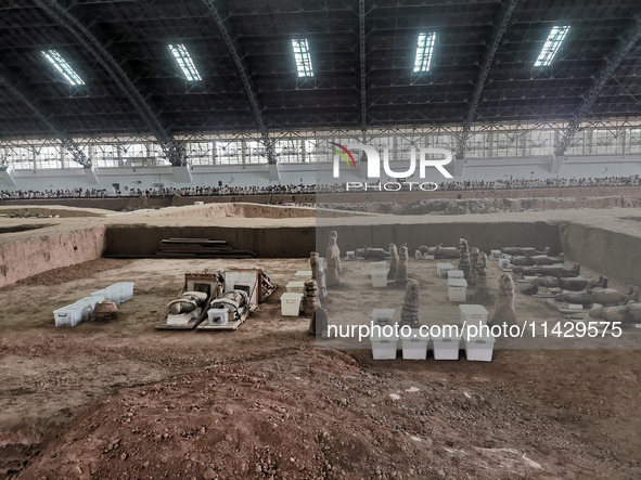 Tourists are visiting Emperor Qinshihuang's Mausoleum Site Museum in Xi'an, China, on July 13, 2024. 