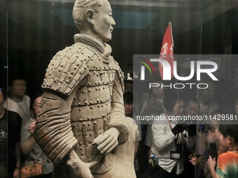 Tourists are visiting Emperor Qinshihuang's Mausoleum Site Museum in Xi'an, China, on July 13, 2024. (