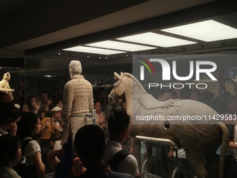 Tourists are visiting Emperor Qinshihuang's Mausoleum Site Museum in Xi'an, China, on July 13, 2024. (