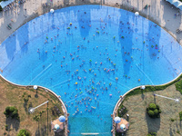 Citizens are cooling off at a water park in Nanjing, China, on July 23, 2024. (