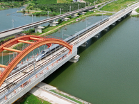 A high-speed comprehensive inspection train is running on the Penglai section of Weifang High-speed Railway in Yantai, China, on July 23, 20...