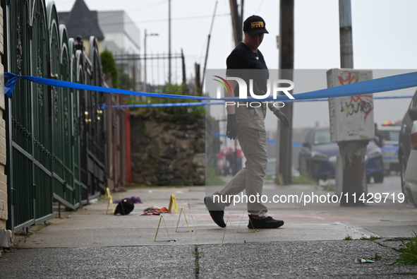 NYPD crime scene investigators are on the scene, investigating the fatal shooting of a 28-year-old male in the Bronx, New York. A 28-year-ol...