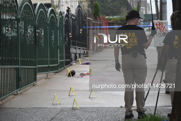 NYPD crime scene investigators are on the scene, investigating the fatal shooting of a 28-year-old male in the Bronx, New York. A 28-year-ol...