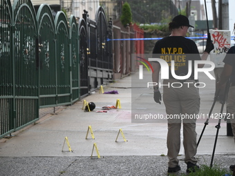 NYPD crime scene investigators are on the scene, investigating the fatal shooting of a 28-year-old male in the Bronx, New York. A 28-year-ol...