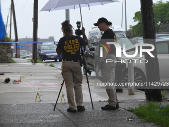 NYPD crime scene investigators are on the scene, investigating the fatal shooting of a 28-year-old male in the Bronx, New York. A 28-year-ol...