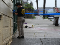 NYPD crime scene investigators are on the scene, investigating the fatal shooting of a 28-year-old male in the Bronx, New York. A 28-year-ol...