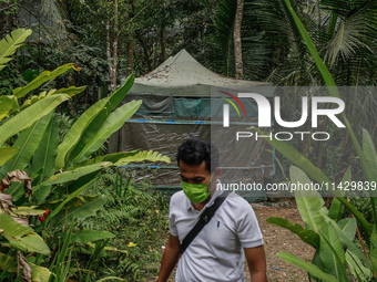 The Indonesian National Narcotic Agency (BNN) is inspecting the lab after a raid of a drug lab, during a press conference in Gianyar, Bali,...