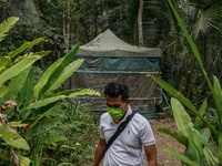 The Indonesian National Narcotic Agency (BNN) is inspecting the lab after a raid of a drug lab, during a press conference in Gianyar, Bali,...