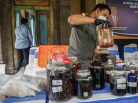 Indonesian National Narcotic Agency (BNN) officers are displaying evidence after a raid of a drug lab, during a press conference in Gianyar,...