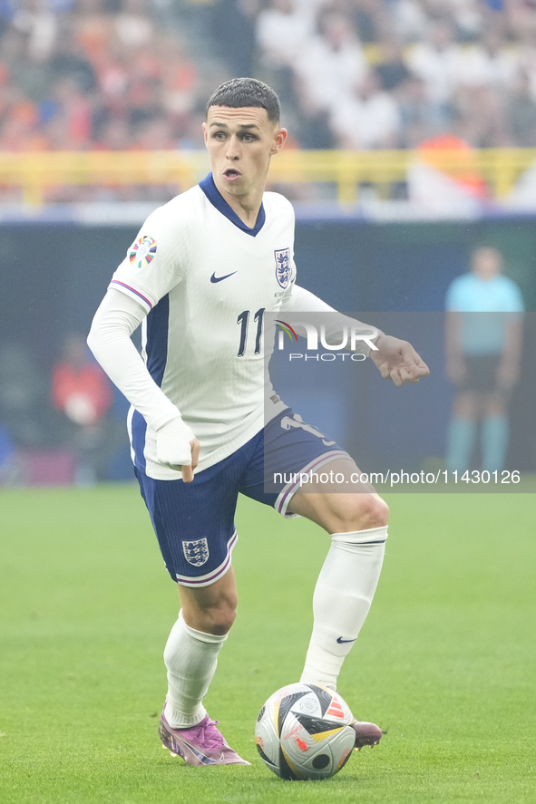 Phil Foden right winger of England and Manchester City during the UEFA EURO 2024 semi-final match between Netherlands and England at Footbal...