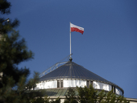 Poland's national flag is fluttering on top of the Polish parliament during a rally in favor of free and safe abortion in Warsaw, Poland, on...