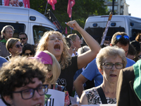 Demonstrators are shouting slogans as they are taking part in a rally in favor of free and safe abortion in Warsaw, Poland, on July 23, 2024...