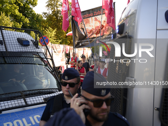 Police officers are dividing Pro-life activists from pro-abortion activists during a rally in favor of free and safe abortion in Warsaw, Pol...