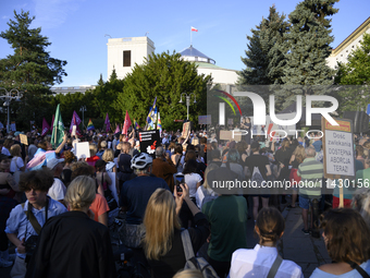 They are shouting slogans as they take part in a rally in favor of free and safe abortion in Warsaw, Poland, on July 23, 2024. Hundreds of d...