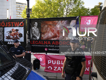 They are shouting slogans as they take part in a rally in favor of free and safe abortion in Warsaw, Poland, on July 23, 2024. Hundreds of d...