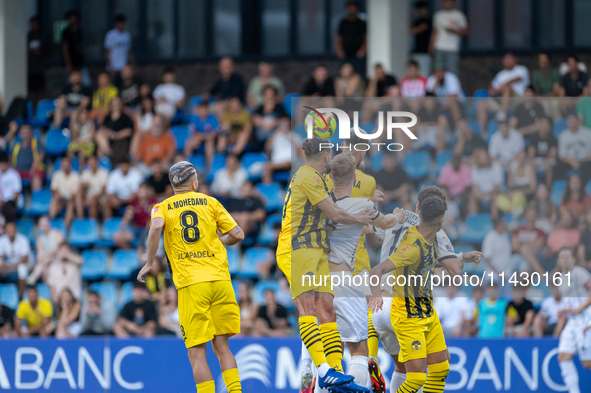 Players are in action during the second phase of the UEFA Champions League Qualification 2024-2025 match between UD Santa Coloma and FC Midt...