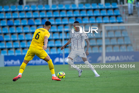 Players are in action during the second phase of the UEFA Champions League Qualification 2024-2025 match between UD Santa Coloma and FC Midt...