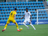 Players are in action during the second phase of the UEFA Champions League Qualification 2024-2025 match between UD Santa Coloma and FC Midt...