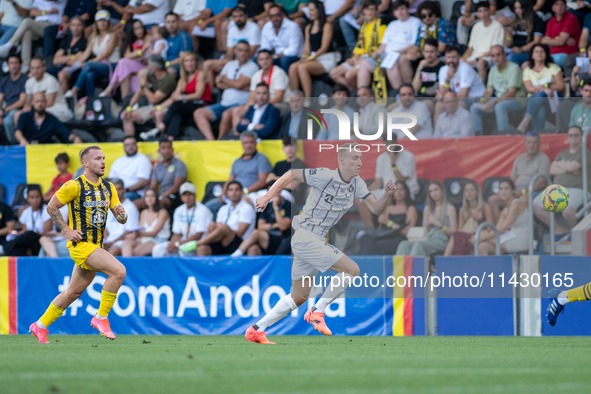 Players are in action during the second phase of the UEFA Champions League Qualification 2024-2025 match between UD Santa Coloma and FC Midt...