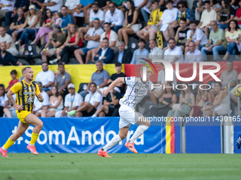 Players are in action during the second phase of the UEFA Champions League Qualification 2024-2025 match between UD Santa Coloma and FC Midt...