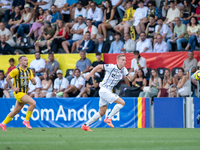 Players are in action during the second phase of the UEFA Champions League Qualification 2024-2025 match between UD Santa Coloma and FC Midt...