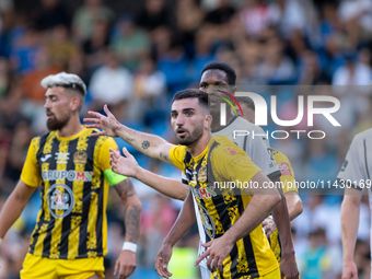 Players are in action during the second phase of the UEFA Champions League Qualification 2024-2025 match between UD Santa Coloma and FC Midt...