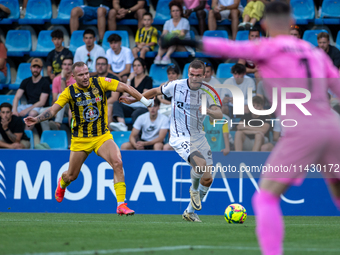 Victor Bak Jensen of FK FC Midtjylland is in action during the second phase of the UEFA Champions League Qualification 2024-2025 match betwe...