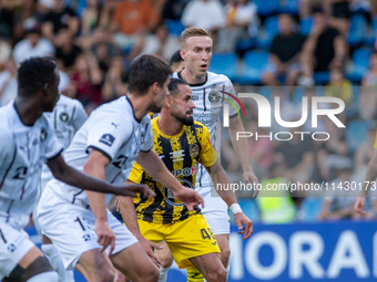 Players are in action during the second phase of the UEFA Champions League Qualification 2024-2025 match between UD Santa Coloma and FC Midt...