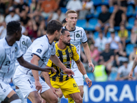 Players are in action during the second phase of the UEFA Champions League Qualification 2024-2025 match between UD Santa Coloma and FC Midt...