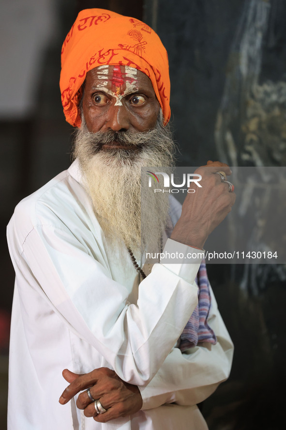 A Hindu community saint is taking part in a meeting led by Raghavacharya Maharaj of Rewasa Dham as they are all welcoming the decision of th...