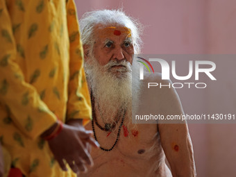 A Hindu community saint is taking part in a meeting led by Raghavacharya Maharaj of Rewasa Dham as they are all welcoming the decision of th...