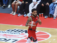 Avry Holmes #12 of Diablos Rojos is handling the ball during the National Professional Basketball League (LNBP) game between Diablos Rojos a...