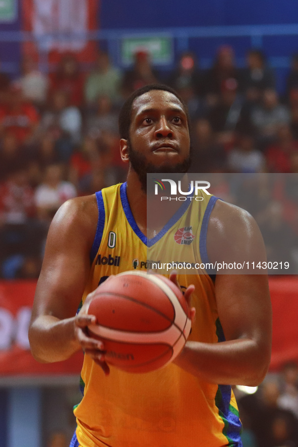 Kevin Allen #0 of Santos is free-throwing during the National Professional Basketball League (LNBP) game between Diablos Rojos and Santos de...