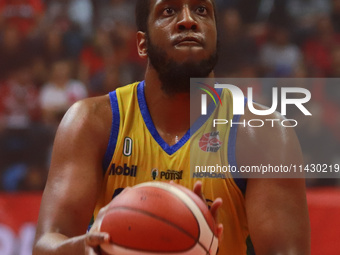 Kevin Allen #0 of Santos is free-throwing during the National Professional Basketball League (LNBP) game between Diablos Rojos and Santos de...