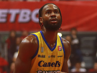 Johnny Hughes III #11 of Santos is preparing to shoot a free throw during the National Professional Basketball League (LNBP) game between Di...