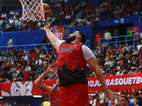 Joshua Ibarra #44 of Diablos Rojos is rebounding during the National Professional Basketball League (LNBP) game between Diablos Rojos and Sa...