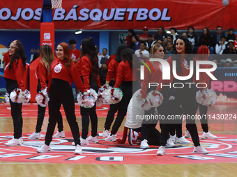 Diablos Rojos Cheerleaders are performing during the National Professional Basketball League (LNBP) game between Diablos Rojos and Santos de...