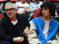 Mexican director Alfonso Cuaron is being seen during the game of the National Professional Basketball League (LNBP) between Diablos Rojos an...