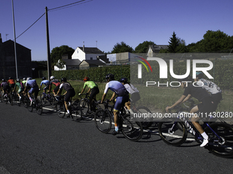 Members of the Mexican triathlon team are cycling during their training for the Paris Olympic Games in Lugo, Galicia, Spain, on July 23, 202...